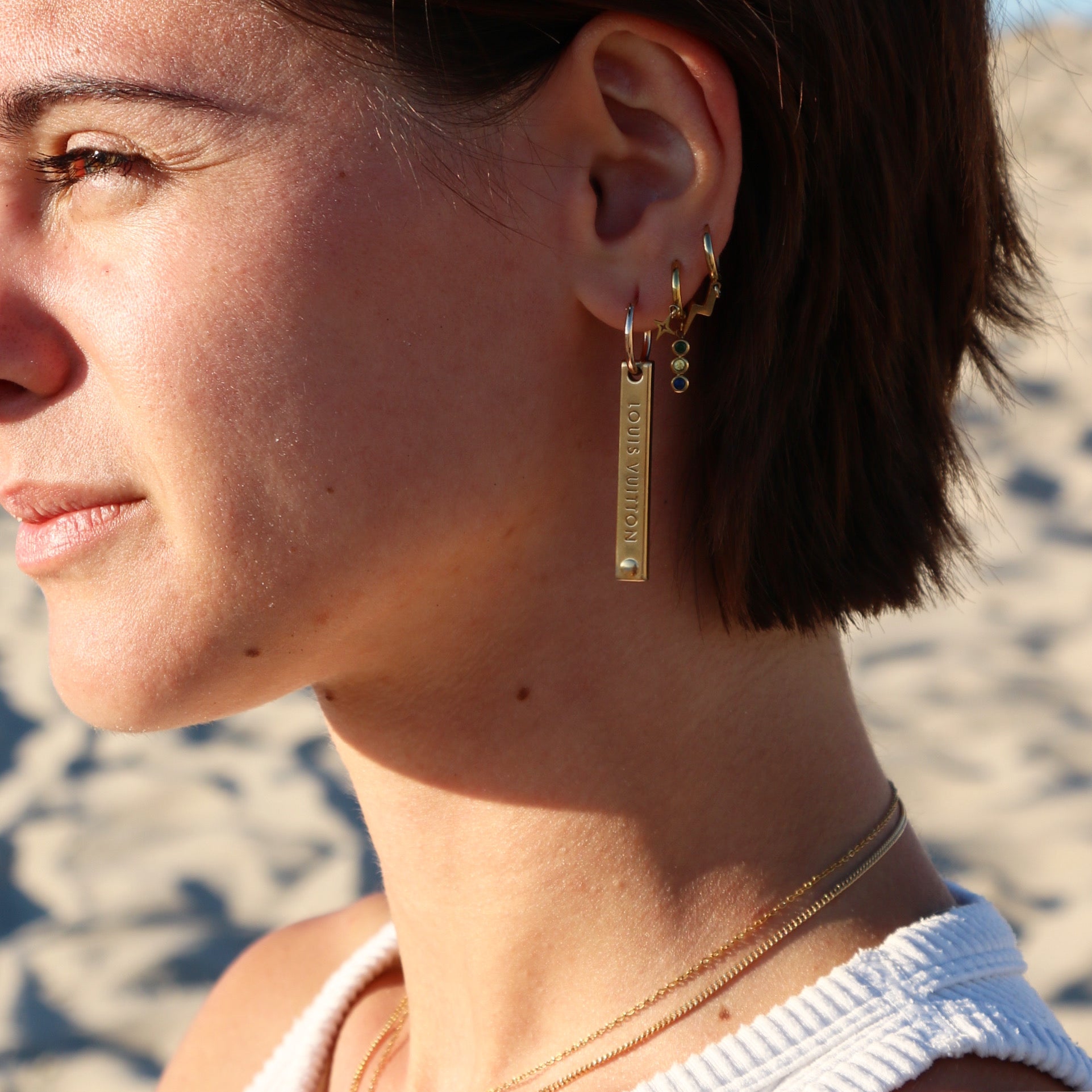 BOUCLE D’OREILLE UPCYCLÉE LOUIS VUITTON