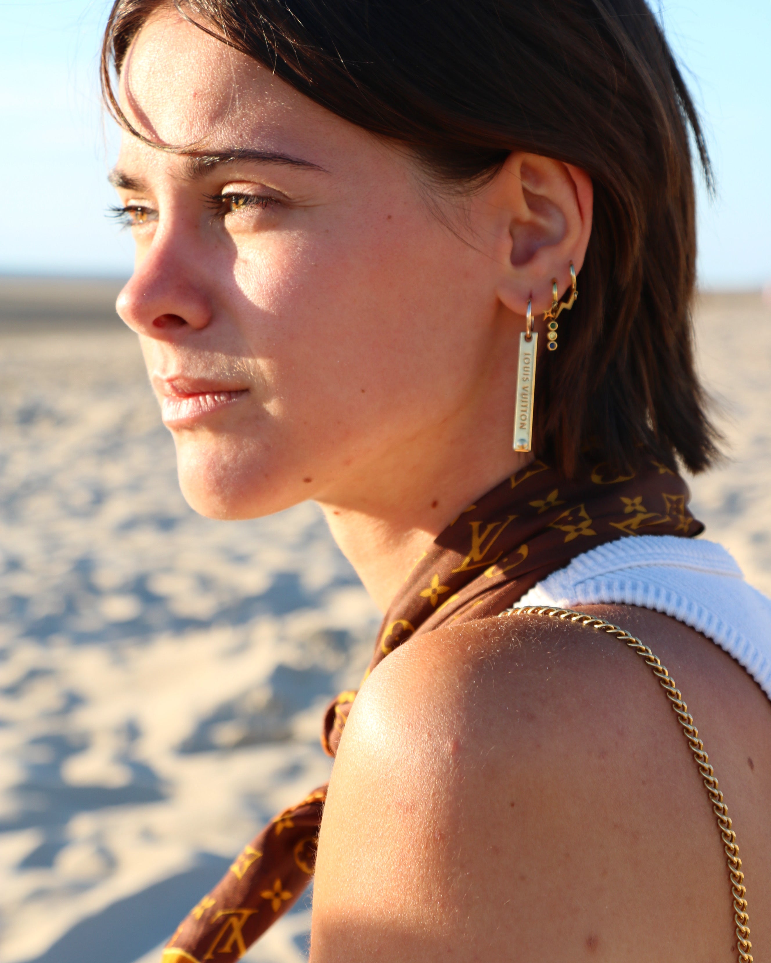 BOUCLE D’OREILLE UPCYCLÉE LOUIS VUITTON