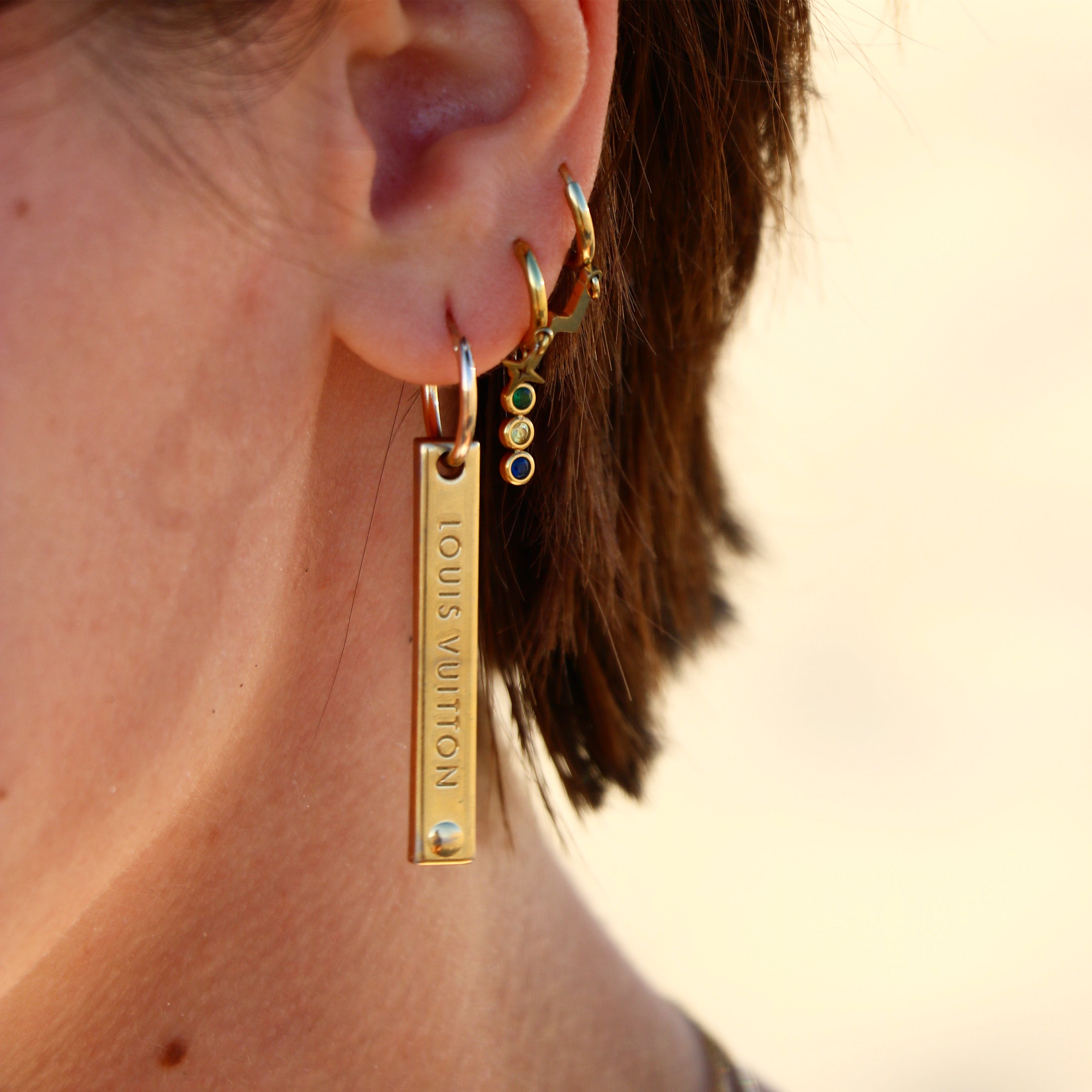 BOUCLE D’OREILLE UPCYCLÉE LOUIS VUITTON