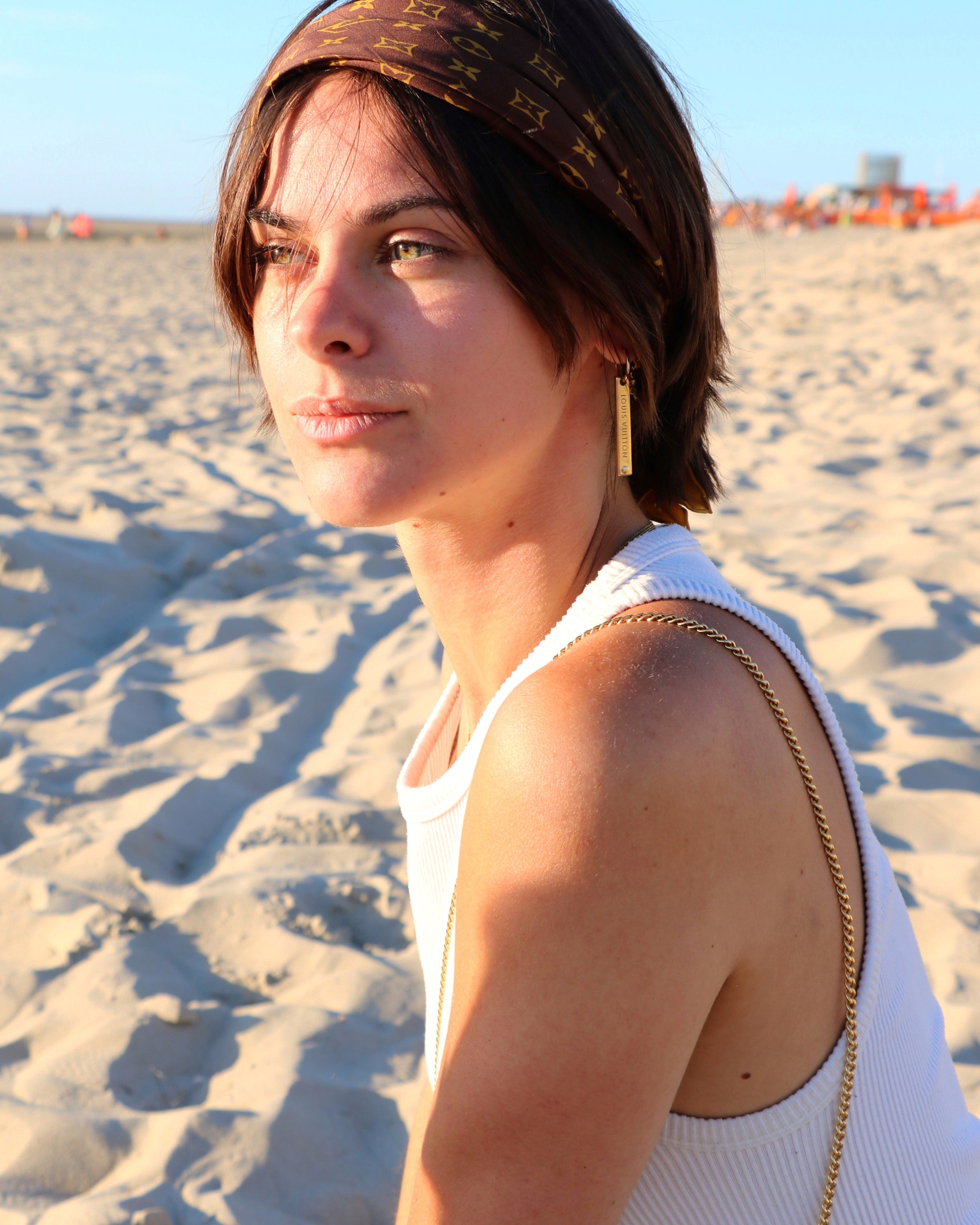 BOUCLE D’OREILLE UPCYCLÉE LOUIS VUITTON