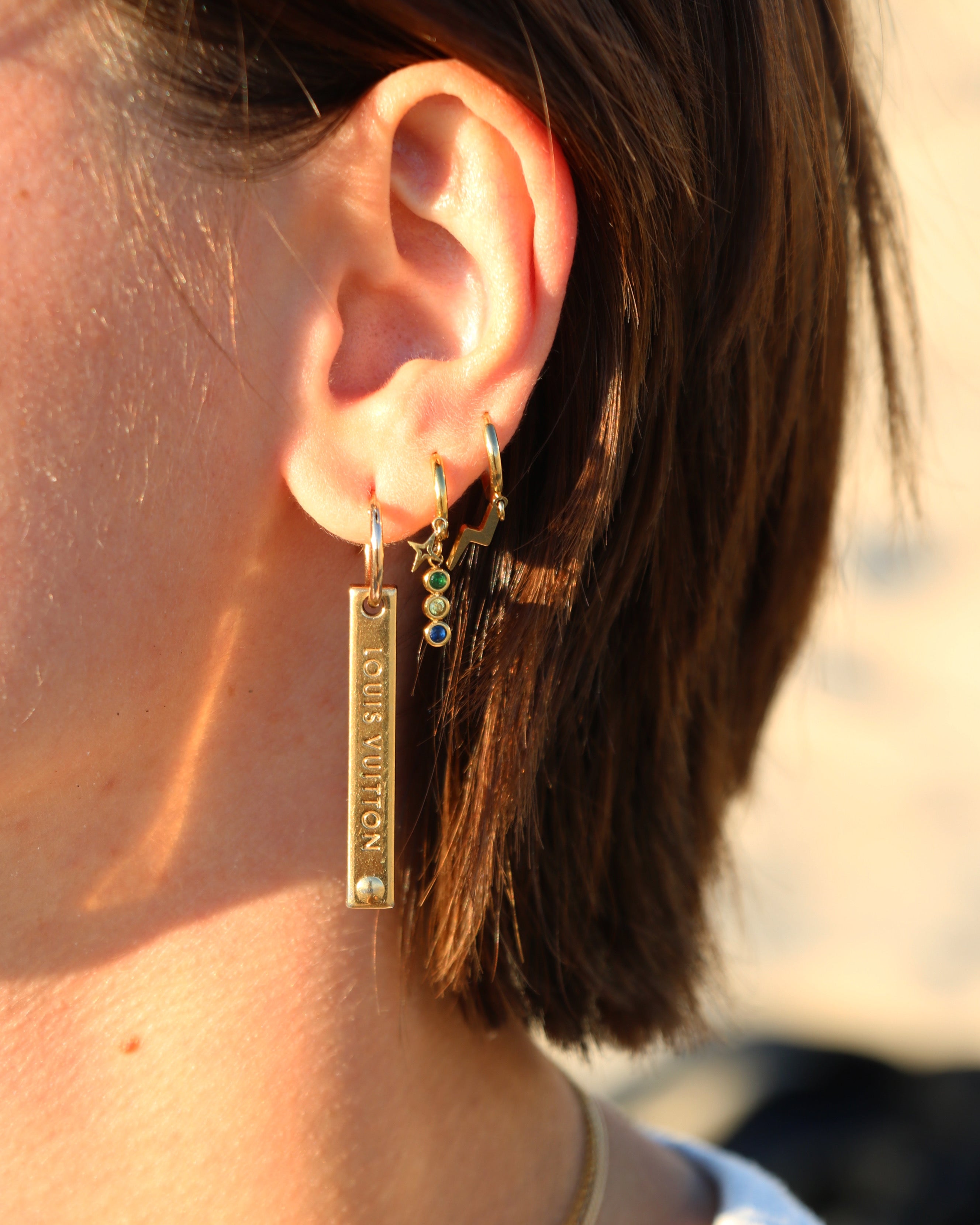 BOUCLE D’OREILLE UPCYCLÉE LOUIS VUITTON